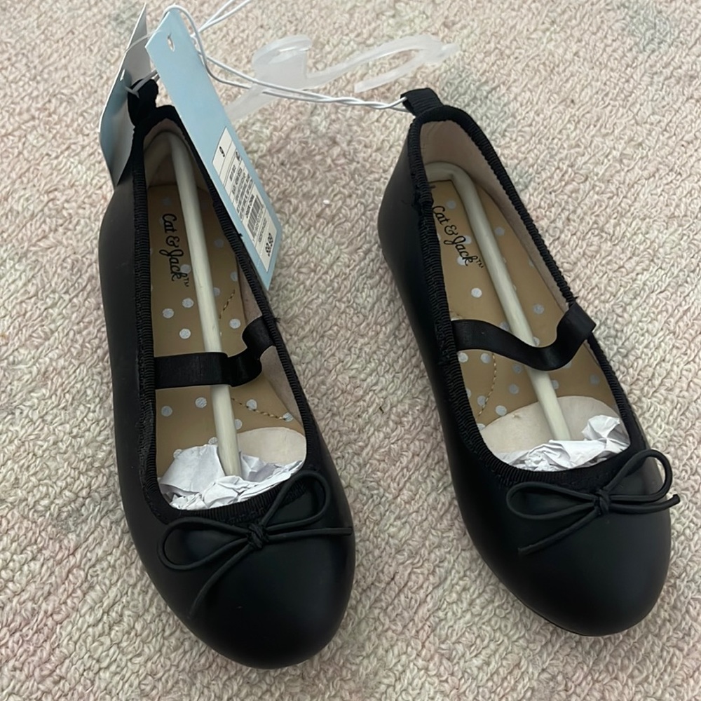 Black faux leather ballet flats